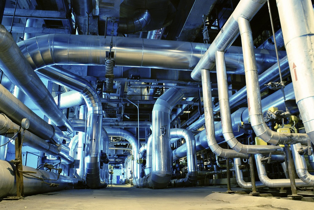 Pipes, tubes, machinery and steam turbine at a power plant